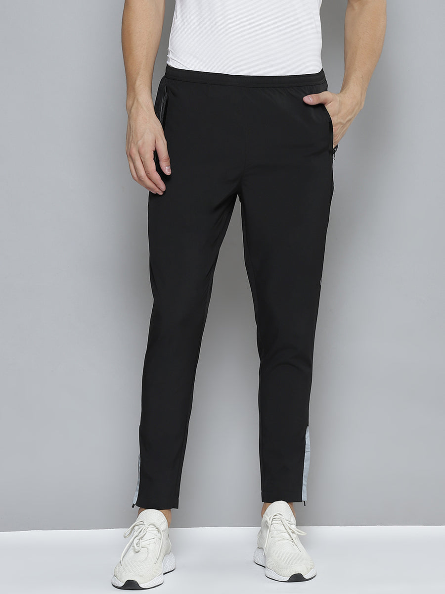 Buy online Black Solid Relaxed Fit Track Pant from bottom wear for